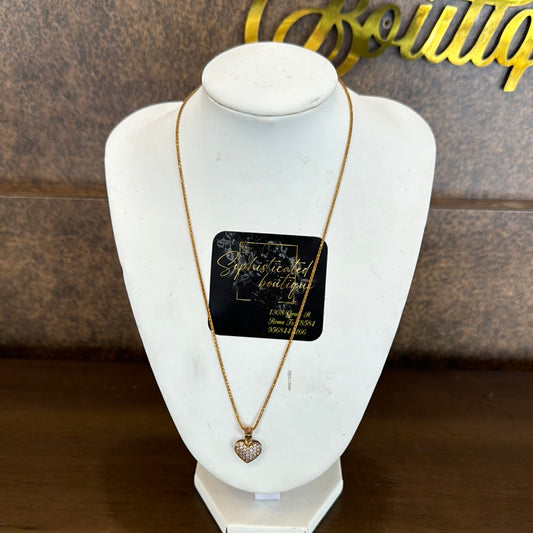 Gold chain with heart charm